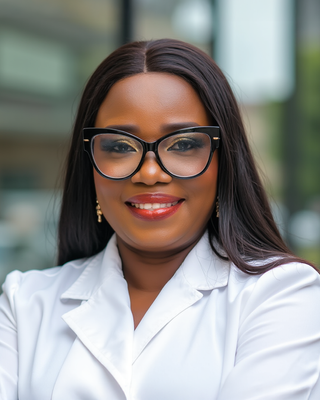 Photo of Olamide Alabi, Psychiatric Nurse Practitioner, PMHNP