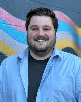 Photo of Ethan St. John, Counselor, LCMHCA, MA