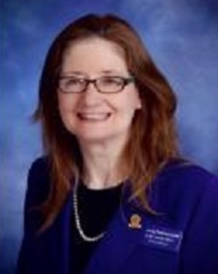 Photo of Theresa Prymuszewski, LCPC, NCC, MTS, MEd, ACS