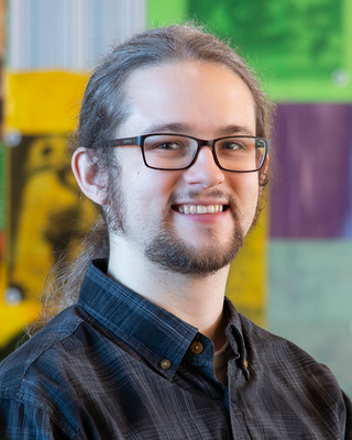 Photo of Alexander Larson, Licensed Professional Clinical Counselor, MPS, LPCC, LADC