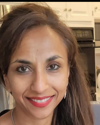 Photo of Dr. Kamaloshini Puthumana - CALMMD, LLC, Psychiatrist, MD