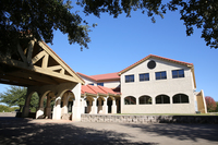 Gallery Photo of The main building houses the dining room, kitchen, counselor's offices, and conference rooms.