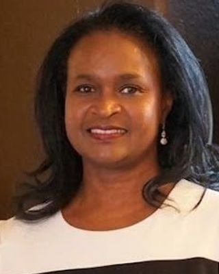 Photo of Naumi Mbuli Munyoki, Psychiatric Nurse Practitioner, DNP, PMHNP, BC