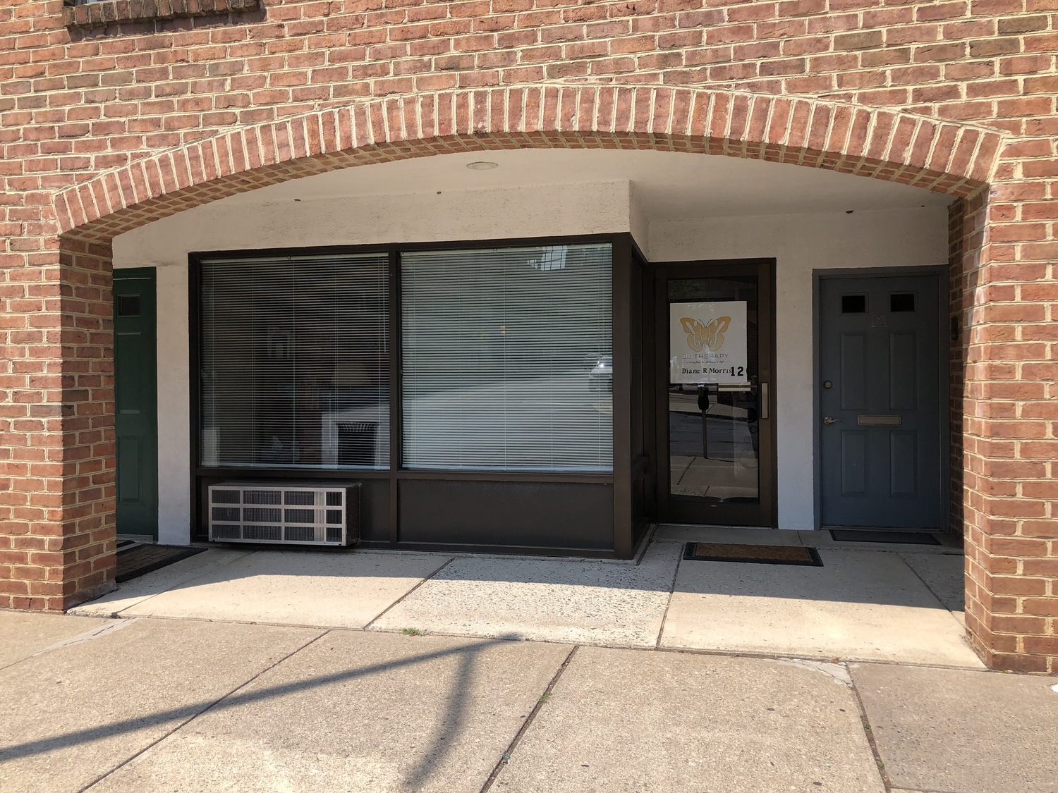 Gallery Photo of Front of building - Suite 12C - second unit in on the corner of Walnut & Guetter