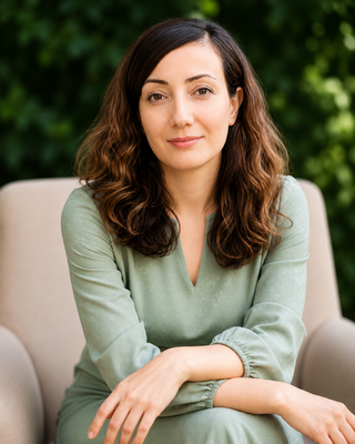 Photo of Dr. Elaheh Raoufi, Registered Psychotherapist, MD, MA, CRPO, CCPA