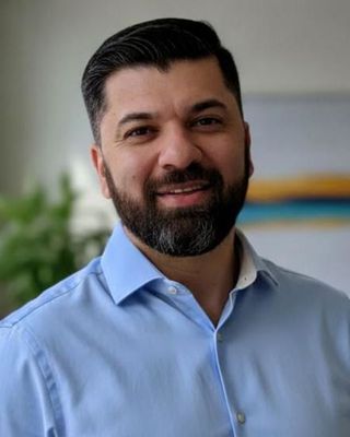 Photo of Dr. Rohul Amin, Psychiatrist, MD, DFAPA, FACP