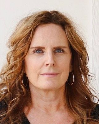 Photo of Suzy Santos, Counselor, MA, MS, CMHC