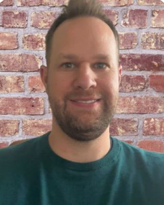 Photo of Zach Hackbarth, Counselor, LMHC