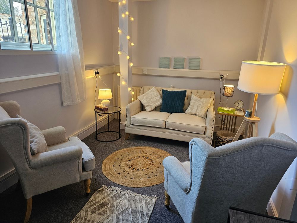 A warm inviting space with soft lighting and comfortable seating