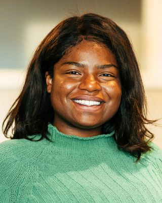 Photo of Adriana Essomba, Pre-Licensed Professional