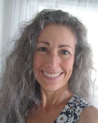 Photo of Mani Dexter, Marriage & Family Therapist Associate, MA, JD, LMFTA