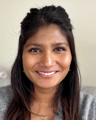 Photo of Simmi Gandhi Acevedo, MA, QMHP