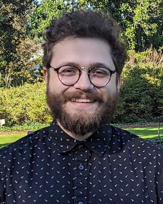 Photo of Atticus Toriello, Counselor, LCMHCA