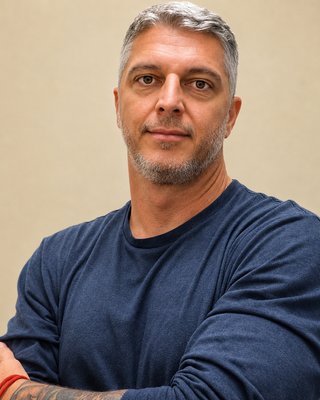 Photo of Garrett Cooper, Counselor, LMHC, QS