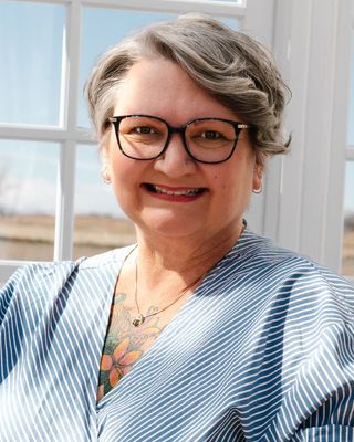 Photo of Heather Frostman - The Tattooed Therapist LLC, Licensed Professional Counselor, LPC, LMHC, NCC