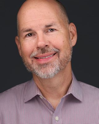 Photo of Trent Scofield, Counselor, MA, ALC, JD