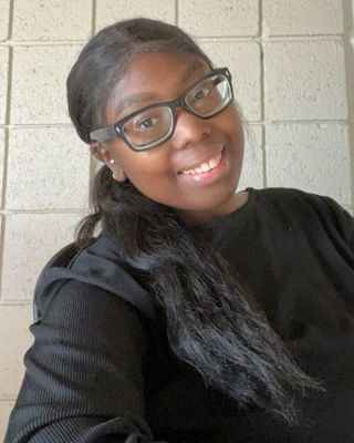 Photo of Herdine Cheridor, Pre-Licensed Professional