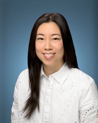 Photo of Courtney Chow, Registered Psychotherapist, MA, RP, R-DMT