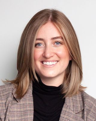 Photo of Michaela Clark, Registered Psychotherapist, BA, MA, CC-PMH