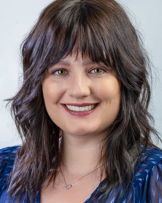 Photo of Melissa Olmedo, Counselor, LMHC-D, LPCC, R-DMT