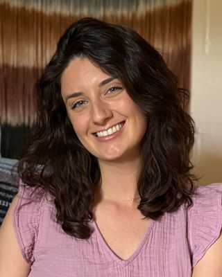 Photo of Caitie Fey, Licensed Professional Counselor, LPC, RYT