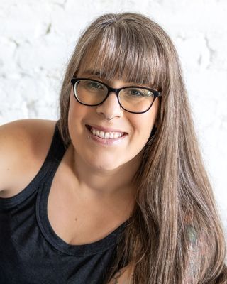 Photo of Krystal Akin, Counselor, MEd, LMHC, E-RYT, TCYM