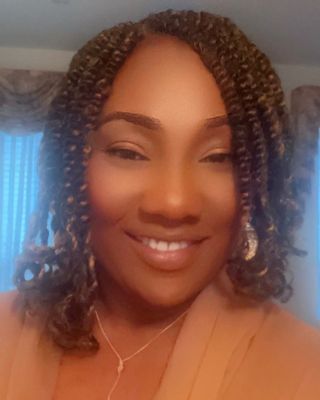 Photo of Temitope Oluwaniyi, Registered Psychotherapist (Qualifying), MA, RP