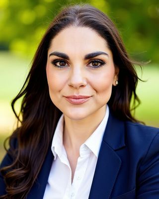 Photo of Justine Framularo, Licensed Mental Health Counselor, MA, LMHC, HMIP, EAGALA