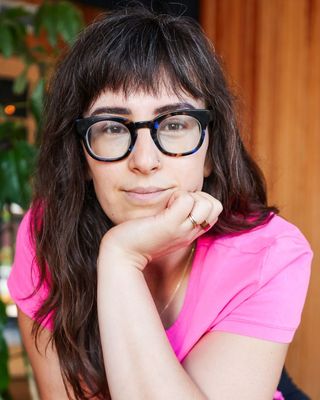 Photo of Cait Van Damm, Occupational Therapist, OTD, OT/L, RYT-500