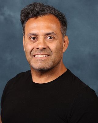 Photo of Armando Manny Slack, Psychiatric Nurse Practitioner, PMHNP, BC, DNP