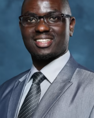 Photo of Peter Moenga, Psychiatric Nurse Practitioner, PMHNP