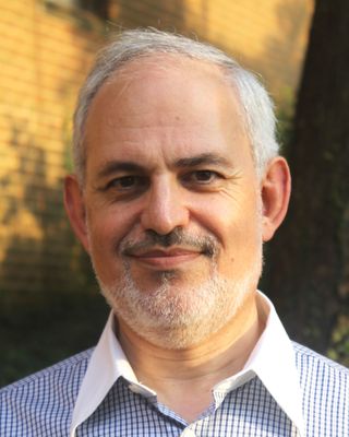 Photo of Gabriel Newman, PhD, CNutr, BCIA, ABDA, Psychologist