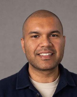 Photo of Mohit Bassi, Counsellor, MEd, RCC, BA Hons