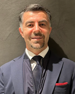 Photo of Ken Genlik, Marriage & Family Therapist, BSW, RSW, MMFT, RMFT, PsyD