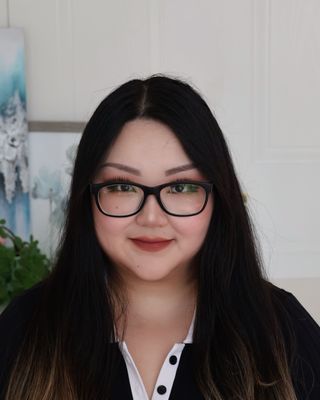 Photo of Cherry (Xinying) Wang, Registered Social Worker, MSW, RSW