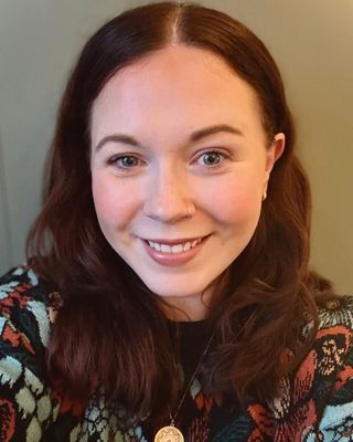 Photo of Lucy Mutch-Burrows, Psychotherapist, MA, MBABCP