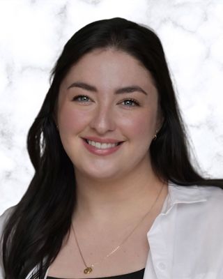 Photo of Madison Carballo, Registered Psychotherapist (Qualifying), BA H, MACP
