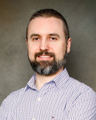 Photo of Dr. Andrew Schade, PsyD, R Psych, Psychologist