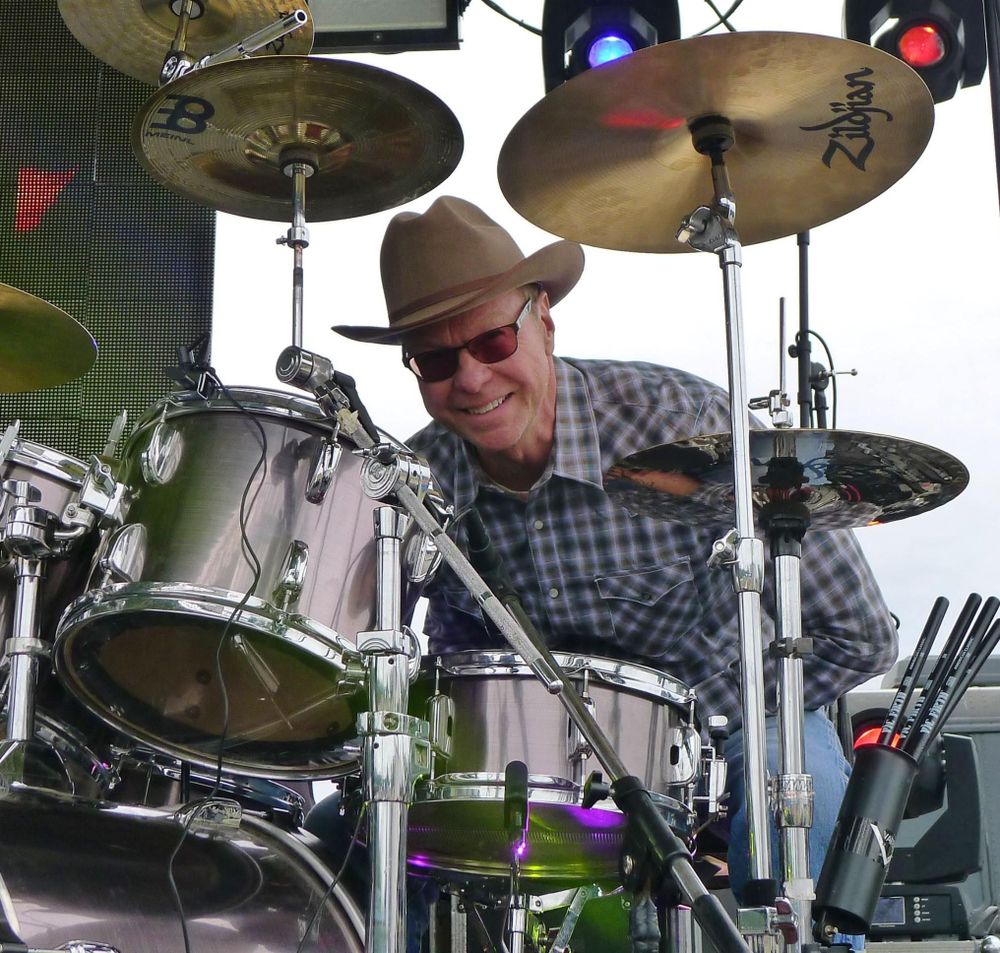 Your Guide - Schu on the Drums
