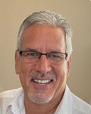 Photo of Michael Cecilio Osborn, Licensed Mental Health Counselor, LMHC, MCAP, CTP