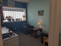 Gallery Photo of My office. The blue colors bring about calmness and usually I have essential oils in the diffuser going.