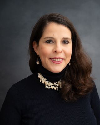 Photo of Dr Natasha Nascimento, Psychotherapist, PhD, MUKCP