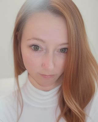 Photo of Laura Reed, Licensed Professional Clinical Counselor, LPCC