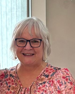 Photo of Dana Hellinger, Counselor, MA, LCPC, LMFT