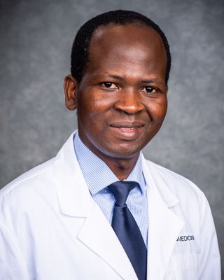 Photo of Dr. Michael Falola, Psychiatrist, MD, MPH