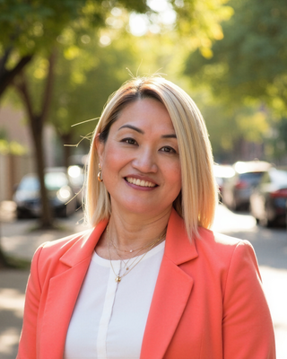 Photo of Kumi Pledger - Kumi Pledger, Counselor, LCPC