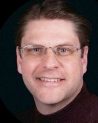 Photo of Andrew Travis, Licensed Social Worker