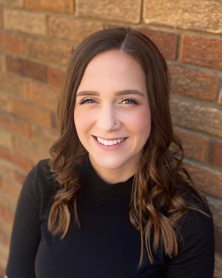 Photo of Emma Bailey, Licensed Professional Counselor, LPC-S, LCPC, PMH-C, RPT