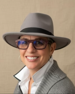 Photo of Kristine Flora, Licensed Mental Health Counselor, LMHC