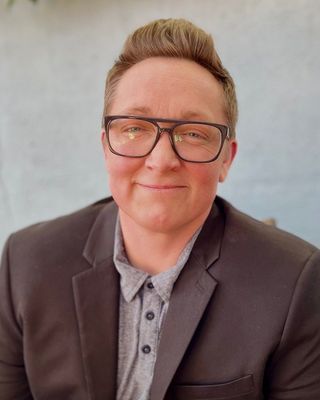 Photo of Cam Dyman, Psychiatric Nurse Practitioner, PMHNP, MHI, RN